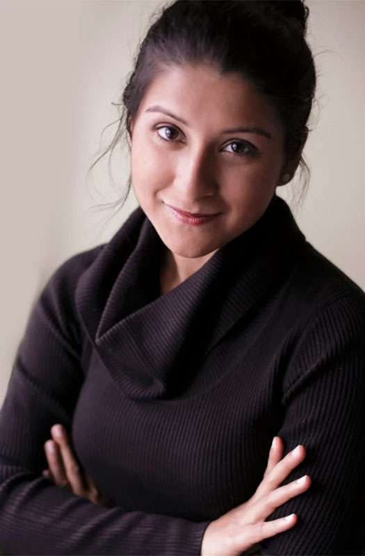 Headshot of Ilham Alam,